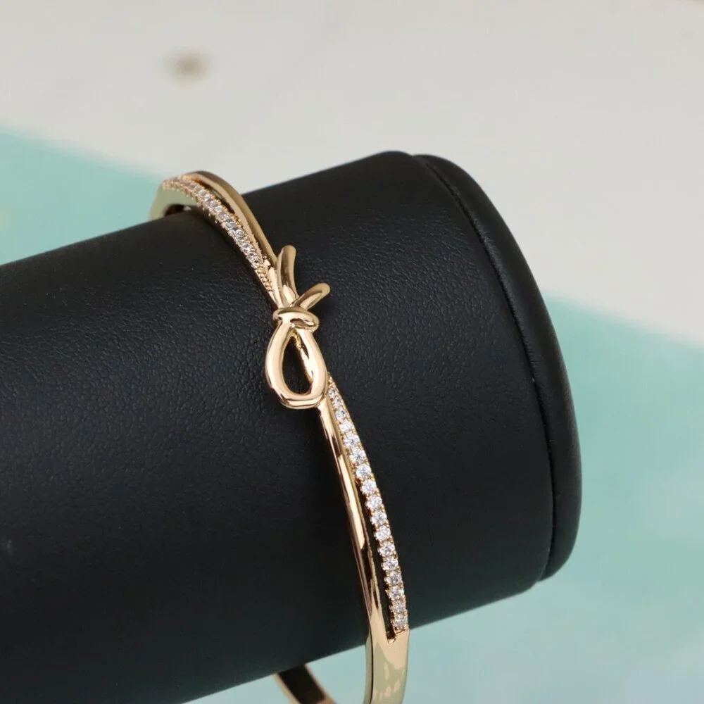 Rose Gold Bow Knot Bangle with Sparkling CZ Accents, XPBL0427